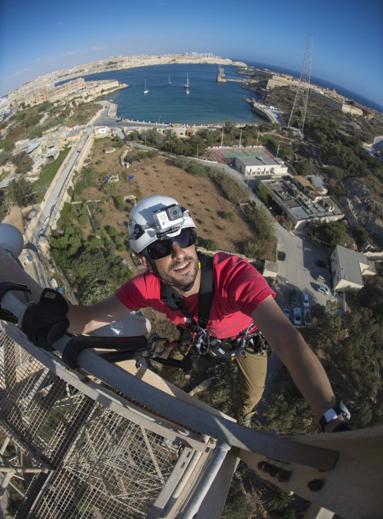 Rope Access professional looking up while working at heights